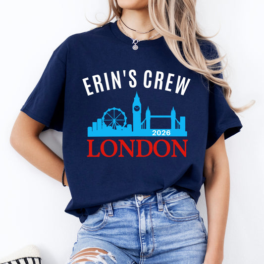 Person wearing a navy blue t-shirt with 'Erin's Crew London 2025' design on a white background