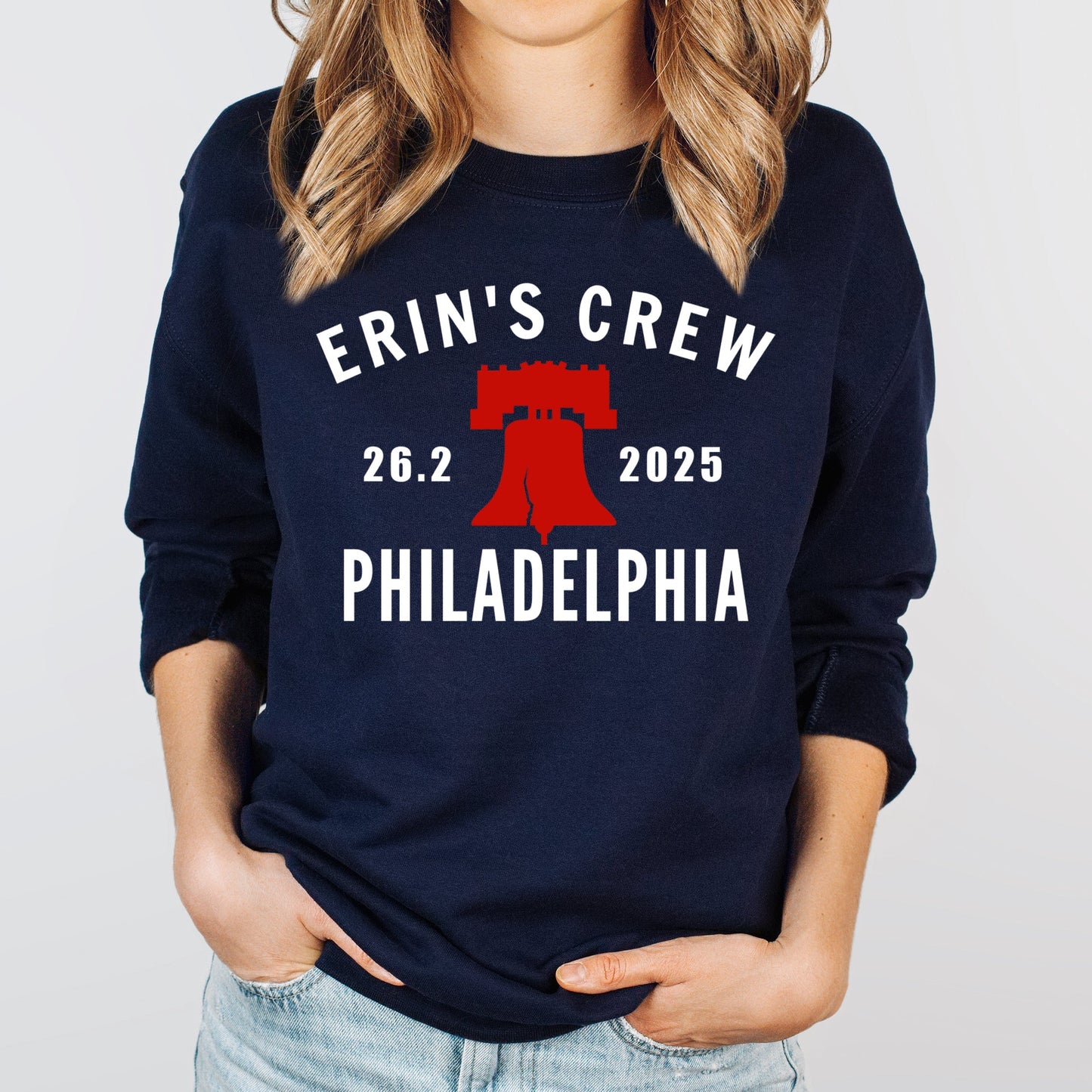 Navy sweatshirt with 'Erin's Crew 26.2 2025 Philadelphia' text and red graphic on a plain background philadelphia marathon support crew shirt